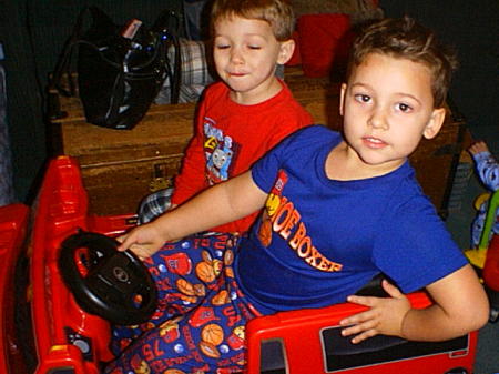 My oldest grandson, Ayden and Peyton in their new Hummer!!!