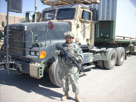 Me in Iraq in front of my truck