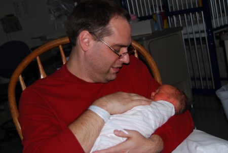 dad holding cooper