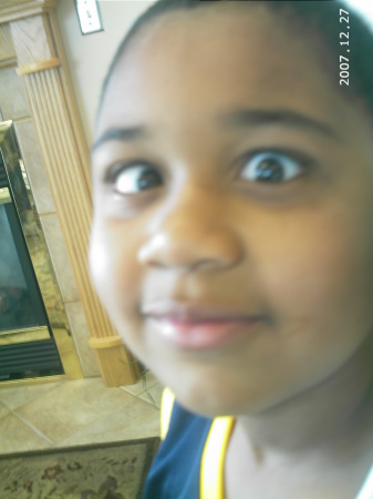 My oldest Kevonte` being silly!!!His eyes are not like that!!LOL