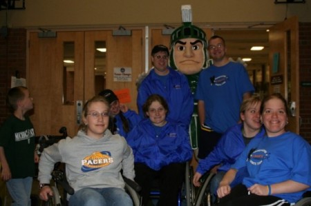 Scott with Sparty and friend, at MSU.