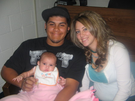 my oldest daughter ashley ,my son inlaw santos and my granddaughter serena 2007