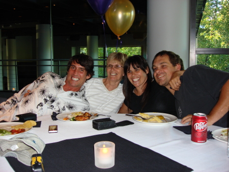 My mom, me my sister Jen and her husband at nephews 16th B-day party.