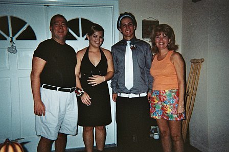 Me, my daughter (Brittany, 15), her escort and my wife Debbie