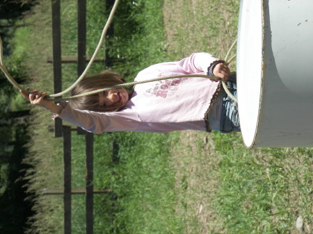 My daughter learning to rope barrels