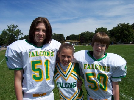 My oldest son Kory (13) neice Mackenzie (10) and youngest son Aaron (11) all play for the Livonia Falcon's Football team.  (Kory has my hair!!!)