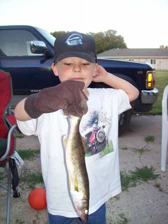 OUR GRANDSON DEREK  WITH HIS FISH
