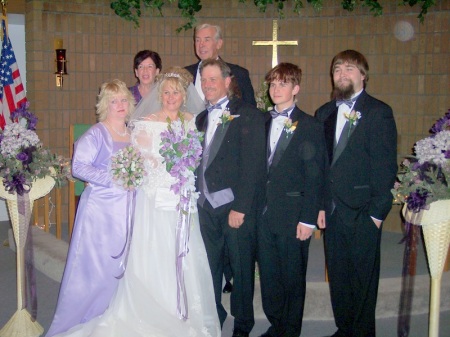 My God Parents Dave and Lisa, My sister Carrie, My son Kyle next to the Groom Dan and Daniel standing next to Kyle