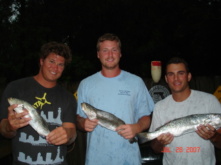 My oldest son with a few of his buddies with the "Catch of the day"