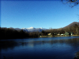 SNOW ON THE CRAGGIES FROM LAKE TOMAHAWK.