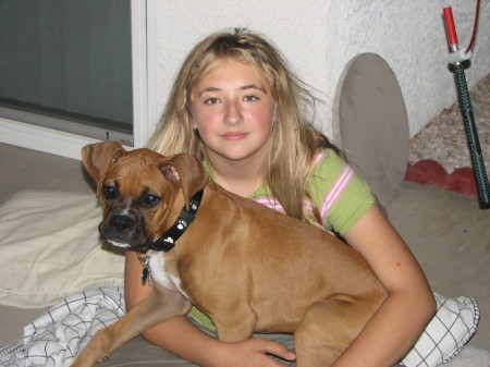 Youngest daughter Madison with Harley her dog