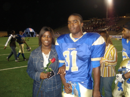 Me and Tyron my oldest son during Senior night for the Varisty football team