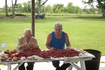 My dad and father-in-law eating crawfish