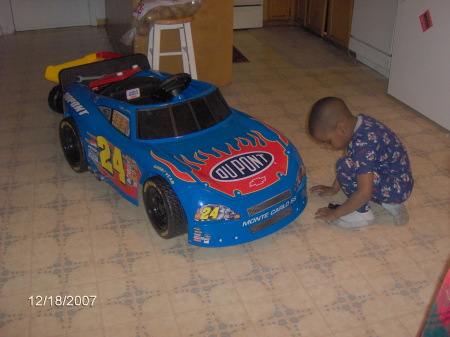 Kristofer (my son) "working" on his race car