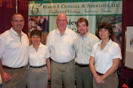 Robert J. Crandall & Assocites - The staff with exhibit at a CSA Confernece