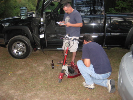 Todd and Matt preparing for a scooter ride at Dega