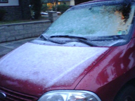 Flipping snow on my car....parked in Rialto...