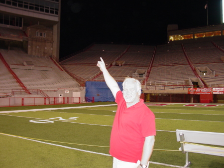 Steve points to our seats.