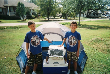 Timothy and Andrew showing off their camping skills