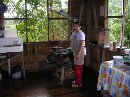 Maria cooking in the jungle house