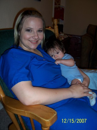 My oldest daughter, Ashley holding Braedon