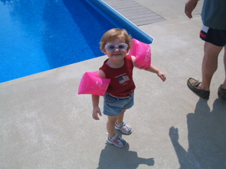 Makensie playing in the family pool