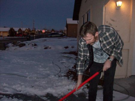 MY HUSBAND ED SHOLVING SNOW 