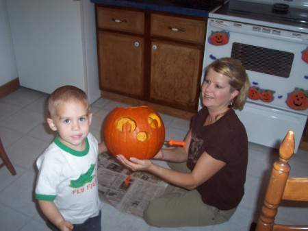 Me with my Grandson Hayden carving pumpkins:)
