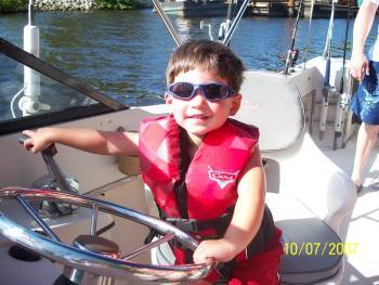 My 3 1/2 yo son Alex loves driving the boat
