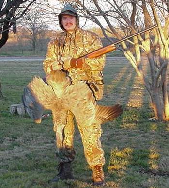 Hunter man with sandhill crane