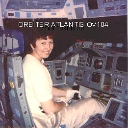 SITTING IN COMMANDERS SEAT ON BOARD SPACE SHUTTLE ORBITER ATLANTIS OV104