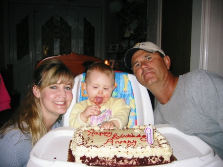 mom dad and avery w b-day cake