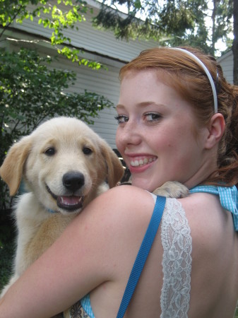 my youngest with her cousin's puppy