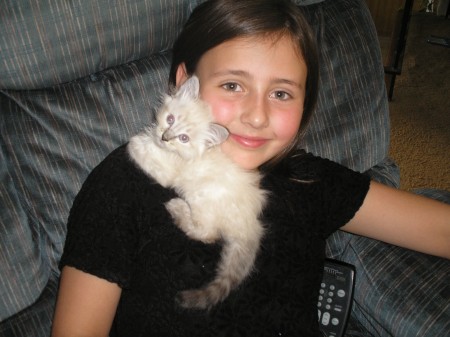 My 7 year old and our new kitty.