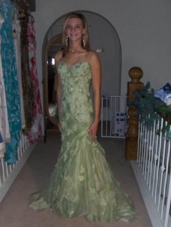 My daughter Madison trying on pageant gowns!