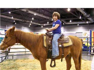 Madison riding a horse 2007.