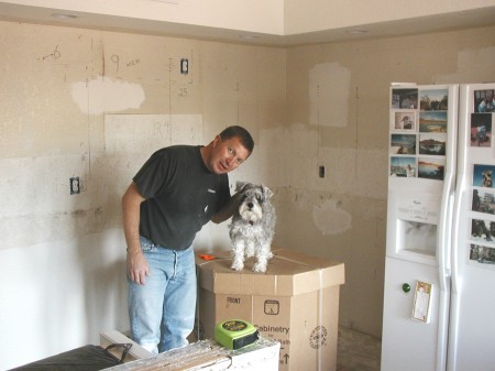 me and Woody - starting to hang cabinets - kitchen remodel at Tucson house