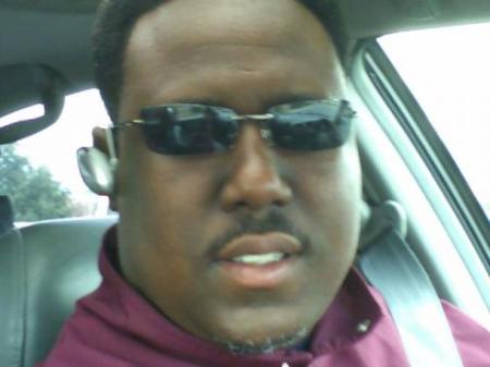 Driving with my Bernie Mac cut!