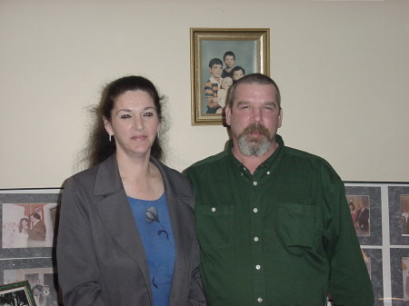 Mom and Dad, that's me in the picture on the wall in the orange shirt