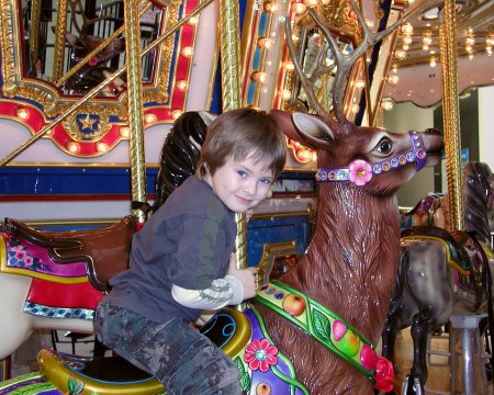 Kevin on a carousel