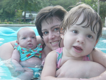 Mommy and the girls in the pool