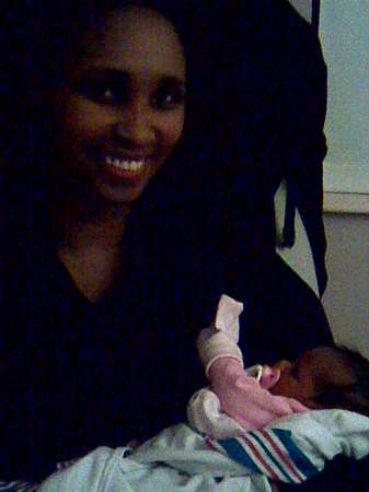 Holding my newborn cousin