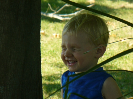 Wyatt got tickled by mom's plant 2007