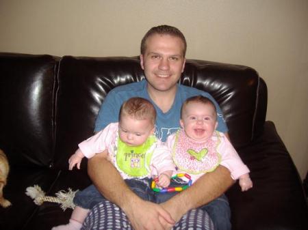 My oldest son with his twin daughters-