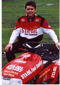 Charles with one of his racing mowers