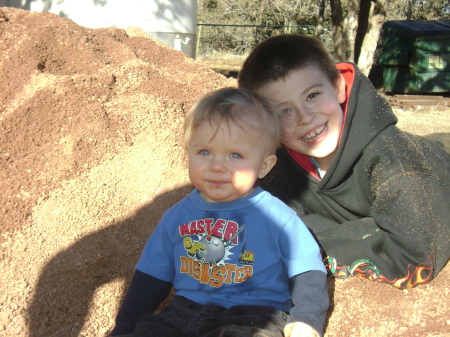 Dylan and William being all boy in the dirt