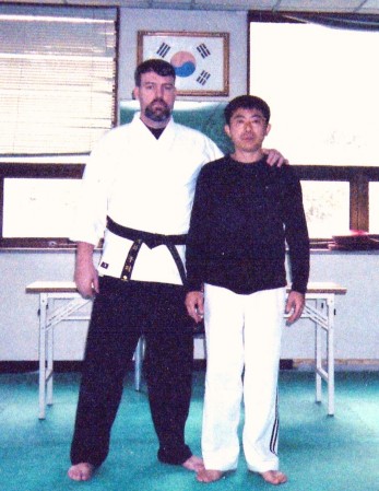 Me with my hapkido master in Korea.