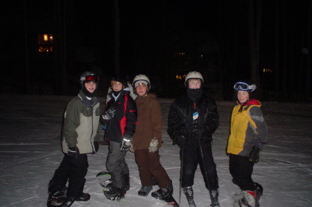 travis snowboarding with friends