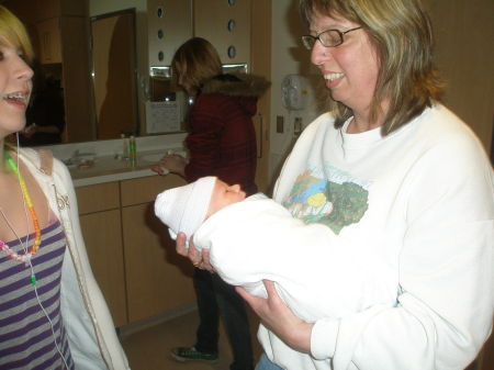 Suzanne and our brand new Grandson