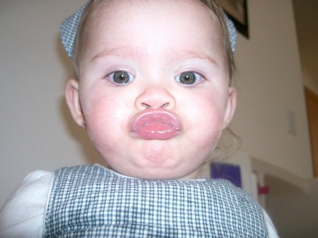 Baby Brenna gives a kiss